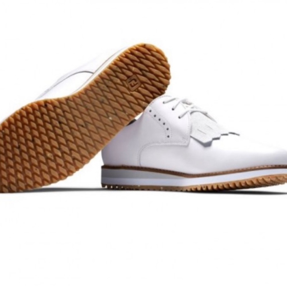 Classic white golf shoes